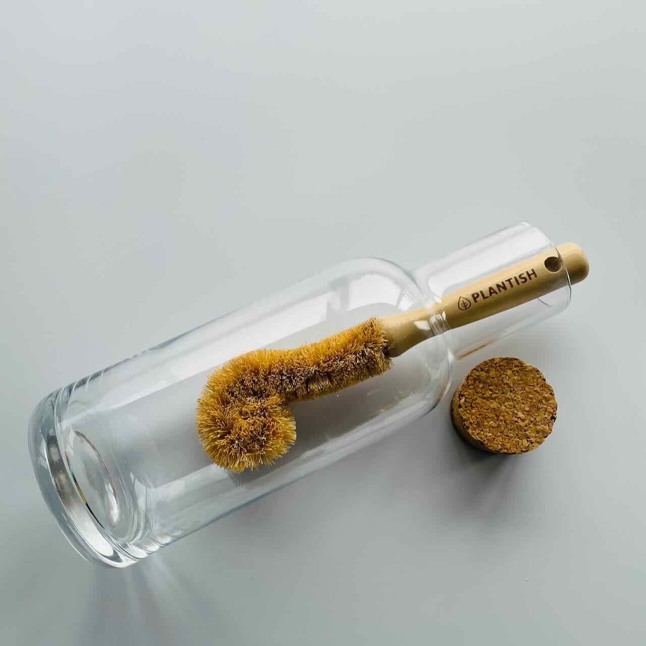 coconut bottle brush inside a large water bottle