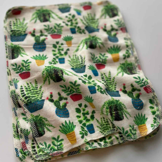 Cactus plants patterned cotton towel on a table