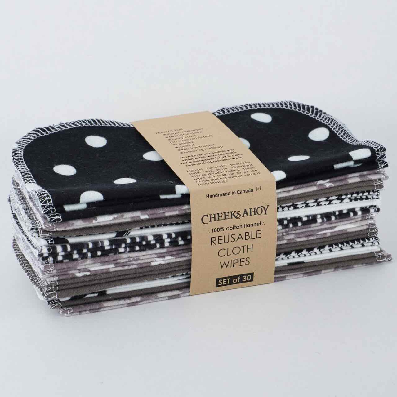 Monochrome patterned cheeks ahoy cloth wipes, set of 30 in its paper sleeve packaging, in a white background drop.