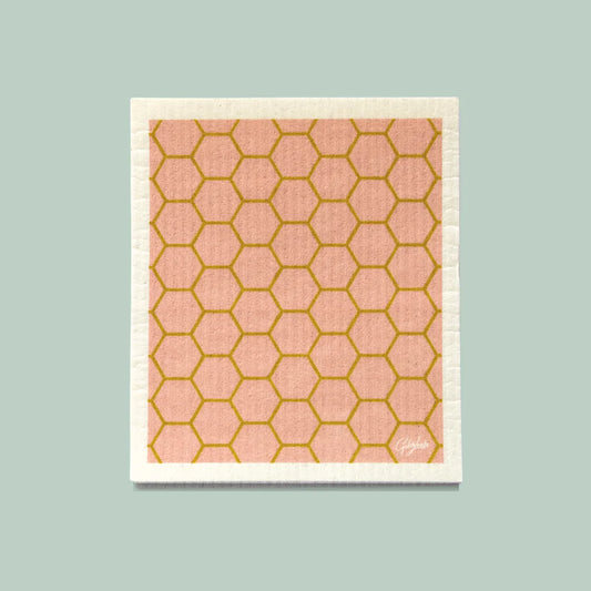 Close up of the Goldilocks honeycomb swedish dishcloth in pink