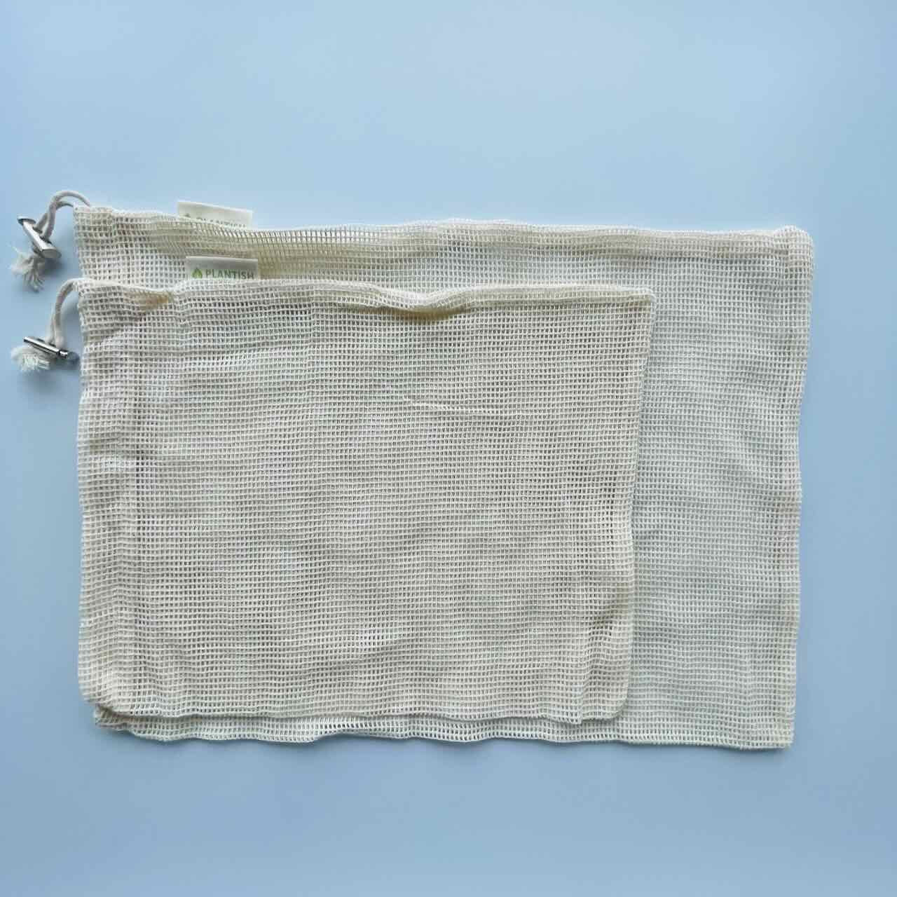set of 2 mesh bags on top of a table