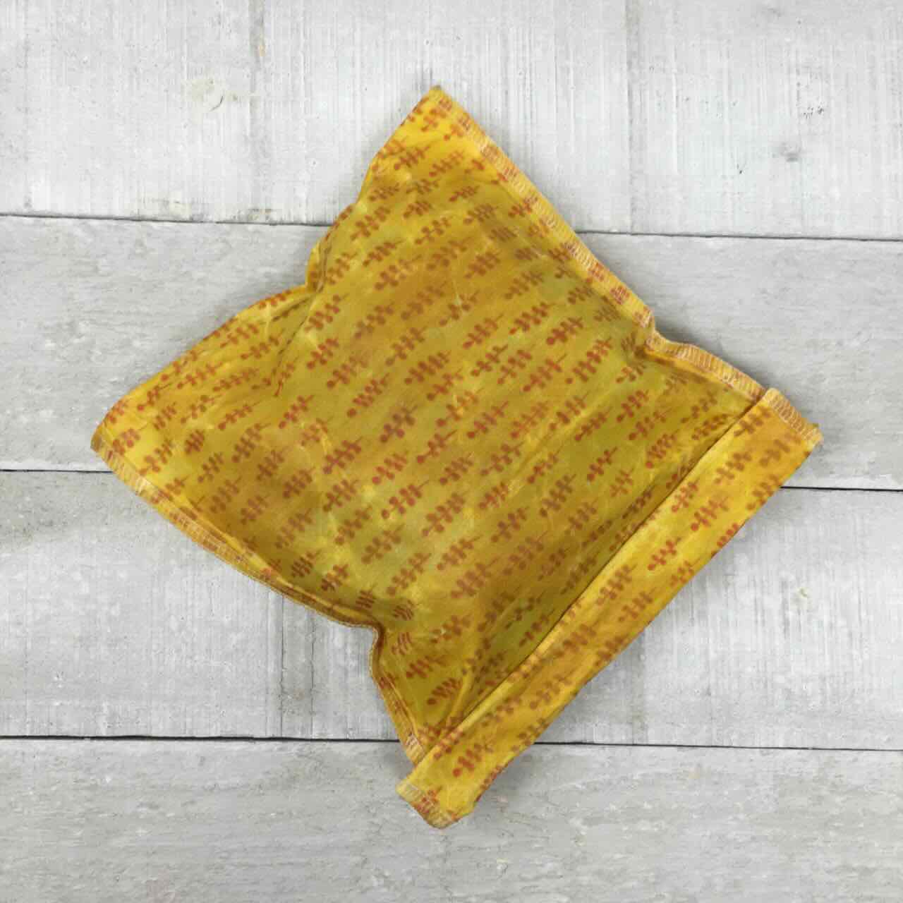 Yellow beeswax wrap with red pepper